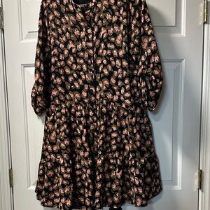 Joy Joy tiered button front dress with roll sleeve.